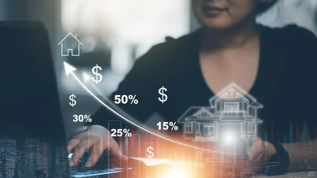 Valorização de imóveis: guia para identificar boas oportunidades Valorização de imóveis representada por gráfico de crescimento com ícones de casas e indicadores financeiros sobre tela de computador